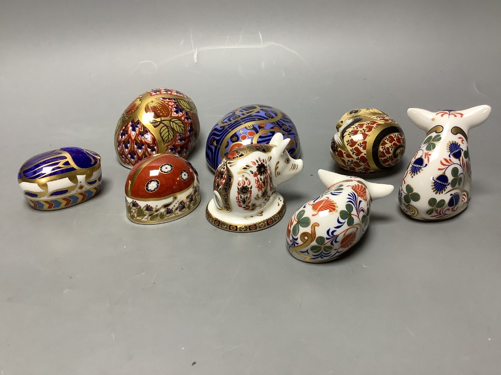 A Royal Crown Derby Collectors Guild Orchard Hedgehog and seven other Royal Crown Derby paperweights